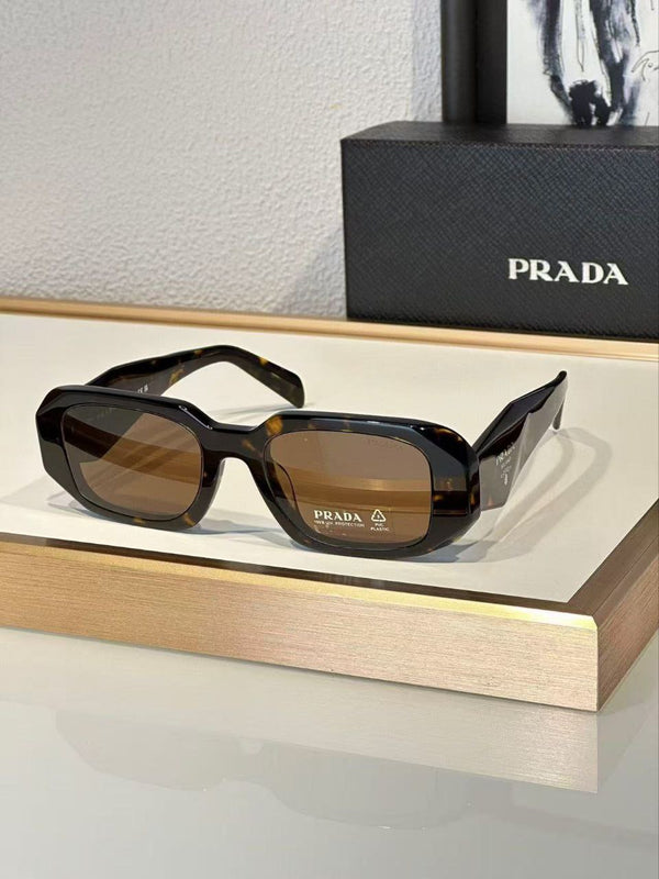 Prada Sunglasses in Honey Tortoise