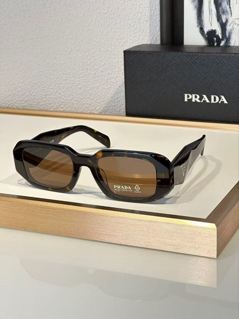 Prada Sunglasses in Honey Tortoise