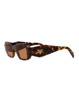 Prada Sunglasses in Honey Tortoise